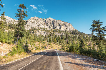 Scenic asphalt road in mountains in Turkey. Travel transport and destinations - obrazy, fototapety, plakaty