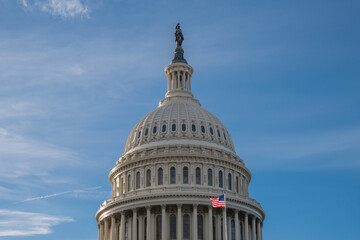 United States Capitol Dome with bright blue sky in background with copy space.
