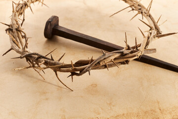 Jesus Crown Thorns and nail on Old and Grunge Background. Vintage Retro Style.
