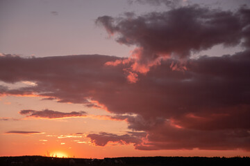 sunset over the clouds