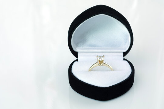 diamond ring in box on white background