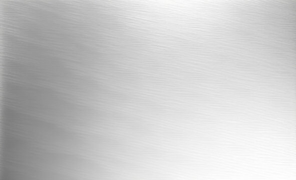 Shiny silver polished metal background texture of brushed stainless steel plate with the reflection of golden light.
