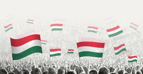 Abstract crowd with flag of Hungary. Peoples protest, revolution, strike and demonstration with flag of Hungary.