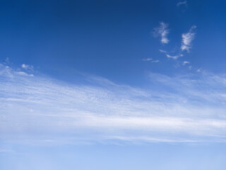 Blue sky with beautiful clouds; background of cloudy sky - 579072711