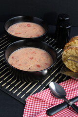 Homemade tomato basil Parmesan soup, served with toasted English muffins.