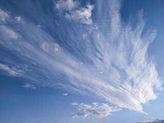 Naklejka na ściany i meble Blue sky with beautiful clouds; background of cloudy sky