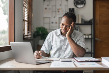 Naklejka premium Tired depressed bored Africans businessman frustrated by business failure