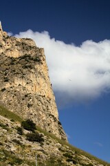 evocative image of sea coast with promontory on the background in Sicily, Italy
