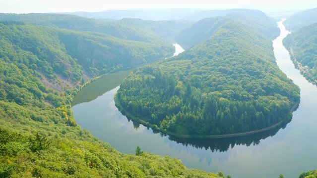 panoramic of Saarschleife - Saar river loop in Saarland, Germany. landmarks, travel guide and postcard. landscape banner