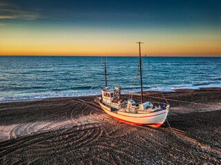 Fishing village Lild in rural Denmark cutters ships boats