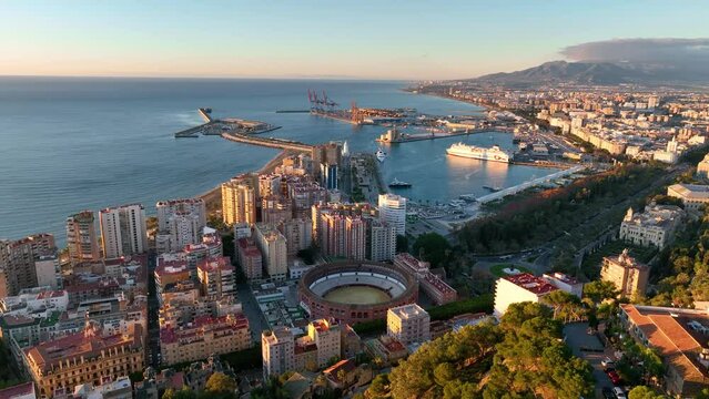 Malaga cityscape, Spain. Malaga waterfront, Plaza de Toros de Ronda bullring in Malaga, Spain.