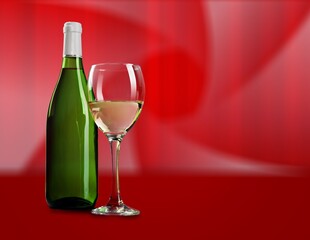 Bottle and glass of tasty red wine.