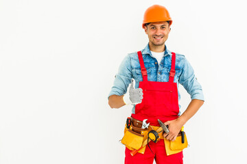 Young construction workers with hard hats on a white background