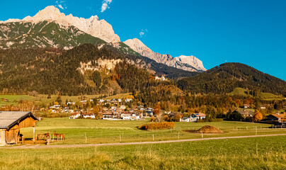 Alpine autumn or indian summer view with horses near Saalfelden am Steinernen Meer, Salzburg,...