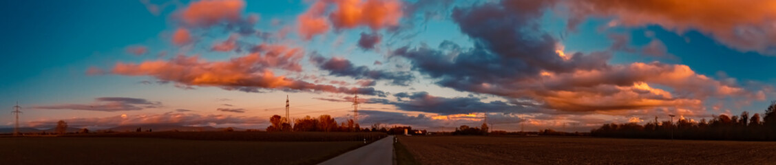 High resolution stitched autumn or indian summer sunset panorama near Tabertshausen, Bavaria, Germany