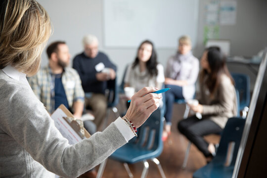 Woman talking at support group in community center