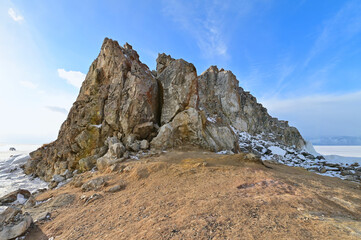 Fototapeta na wymiar Shaman Rock on Olkhon Island During Winter at Lake Baikal
