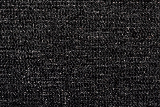 Gray fabric. Material for tailoring. Pattern with straight small dark lines © Vadzim