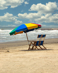 beach umbrella and chairs