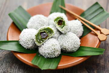 Onde-onde is a traditional Malaysian dessert consisting of green(made from pandan leaves juice)...