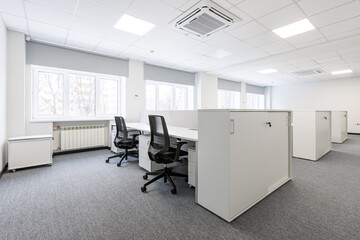 Modern white and gray open space office interior