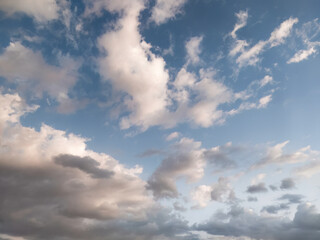 Naklejka na ściany i meble Blue sky with beautiful colorfull clouds; background of cloudy sky