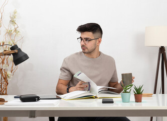 Young man working in home office.education.business.e-commerce