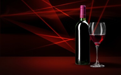 Bottle and glass of tasty red wine.