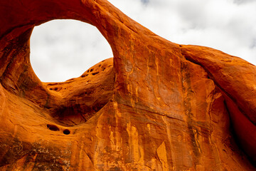 Moccasin Arch deep in Monument Valley, Sandstone Arch