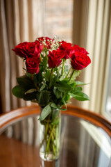 bouquet of red roses in a vase