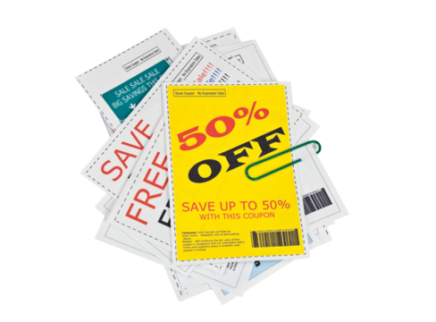 Completely fake store coupons.  Fictional bar codes.  All coupons were created by the photographer.  Isolated with cut out background.