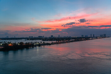 landscape of Miami port before sunrise, tropical seacoast under twilight