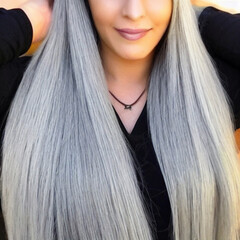 Woman with beautiful long grey hair