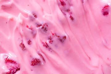 Macro strawberry flavor yogurt background,Texture of ice cream with strawberries and raspberries