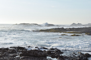 Waves crashing on rocks