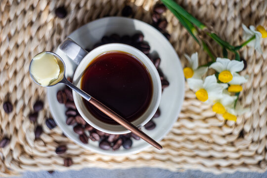 Bulletproof coffee with spices and flowers