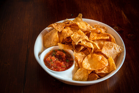Mexican corn chips with salsa sauce