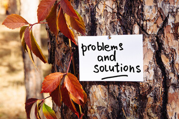 Problems and solutions - motivation card with psychological concept on nature background