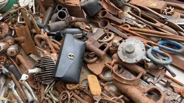 A flea market of old rusty things and tools.