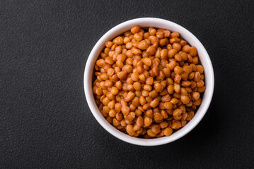 Delicious healthy canned lentils in a ceramic ribbed white bowl
