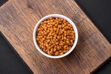 Delicious healthy canned lentils in a ceramic ribbed white bowl