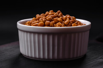 Delicious healthy canned lentils in a ceramic ribbed white bowl