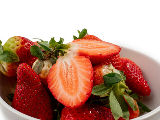 Ripe juicy strawberry isolated on white background. Close-up.