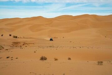 Fototapeta na wymiar Canam UTV side by side off-roading in Glamis Desert