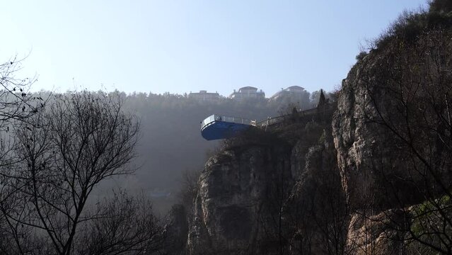 Tokatli canyon with far view of Crystal Glass Terrace (Kristal Cam Teras in Turkish) in a foggy day. Safranbolu, Karabuk, Turkey