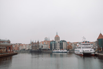 Obraz na płótnie Canvas Beautiful Gdansk over the Motlawa river at fog. Poland. High quality FullHD footage