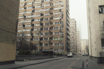 Depressive gray socialist apartment blocks in Warsaw, Poland