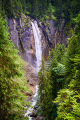 Fototapeta na wymiar Waterfall Pochtenfall near the municipality Aeschi-bei-Spiez in the canton of Bern, Switzerland