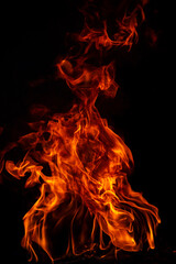 Blaze burning fire flame on art texture background.