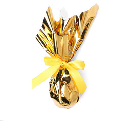 Chocolate Easter egg wrapped in foil on white background